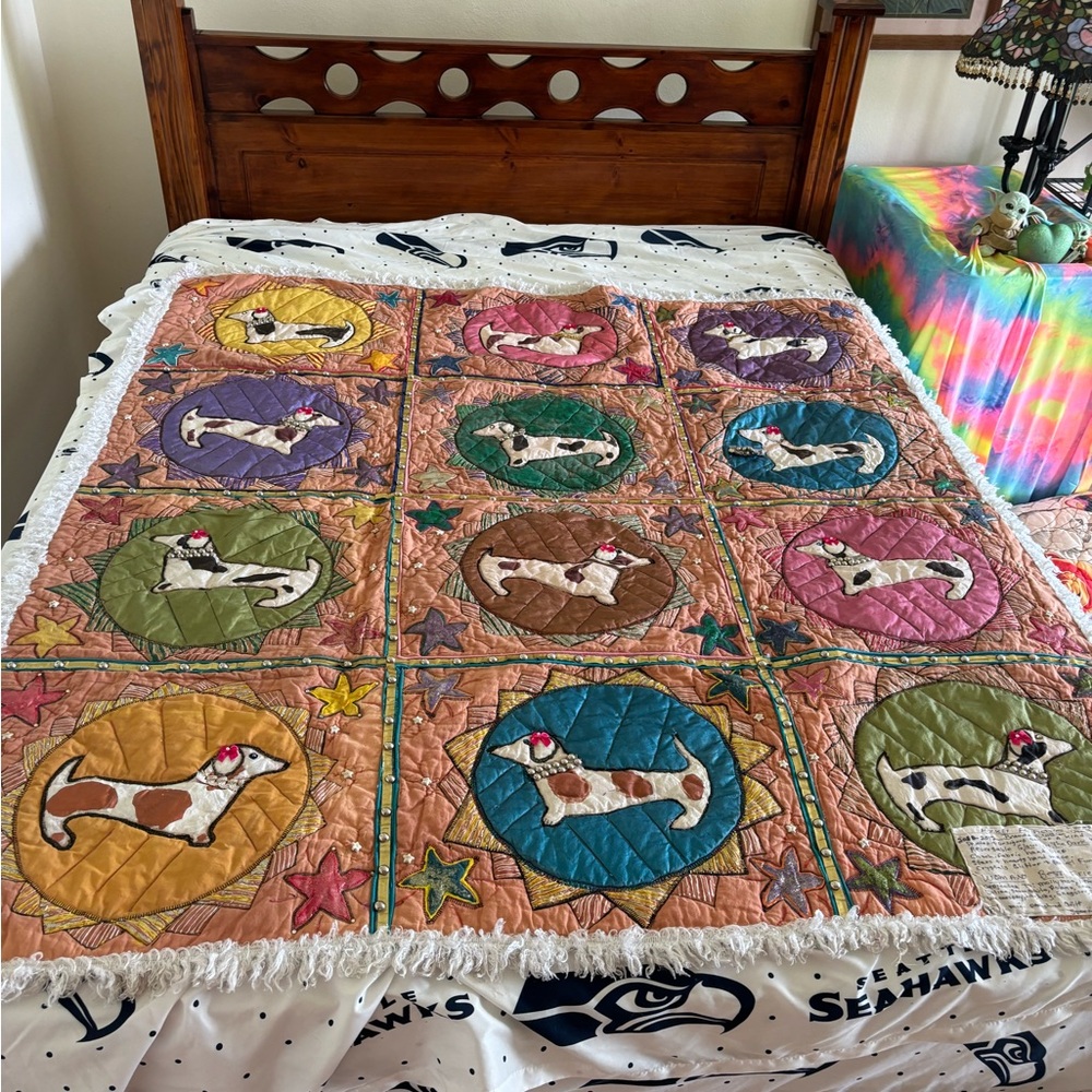 This mini dachshund quilt has two sides.